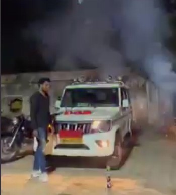 Cake cut and fireworks done on a vehicle with red light