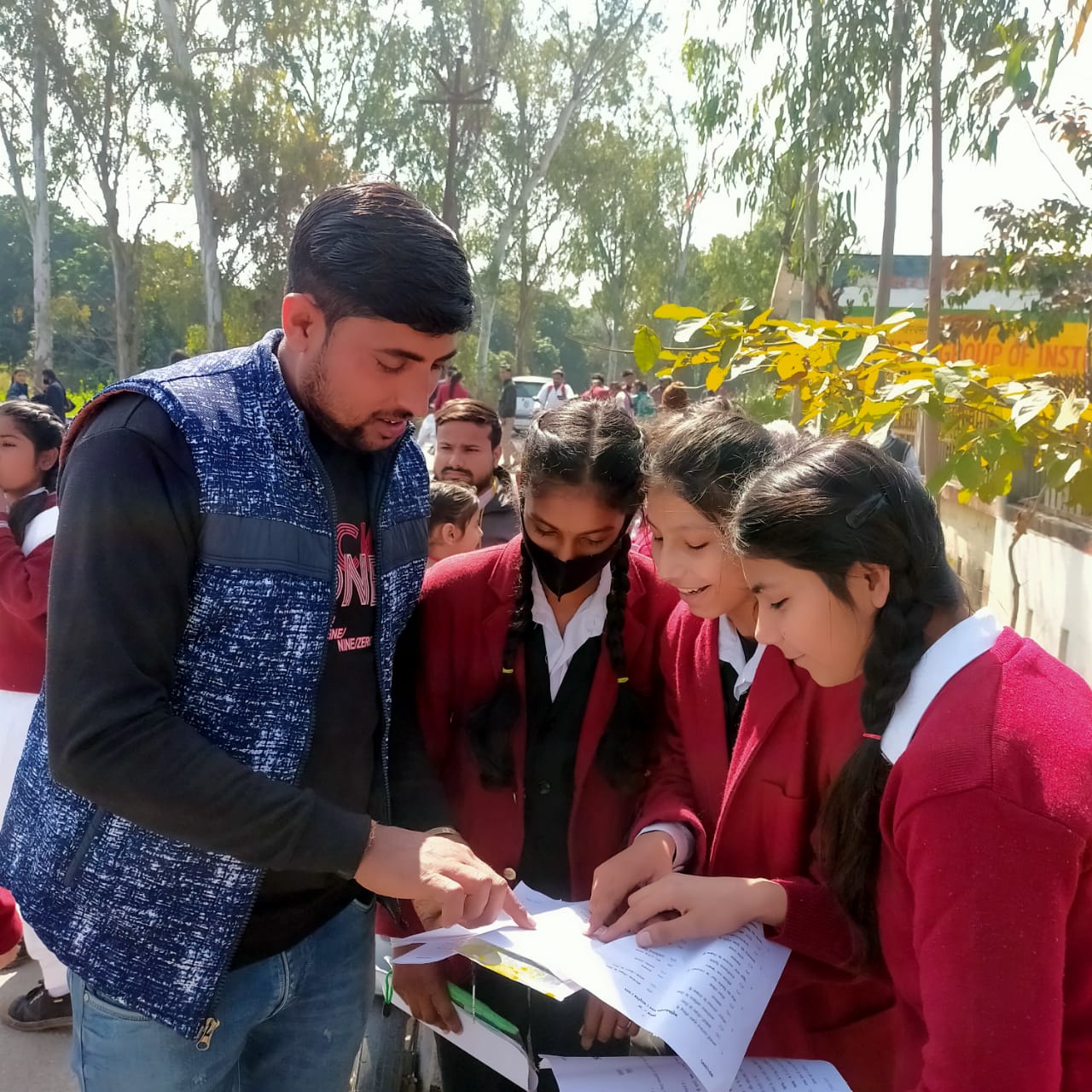 When the class 10th students came out of the center after giving the board exam, the school teachers met them and got information about the paper