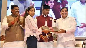 A program was organized in Bhopal to transfer laptop money among school children