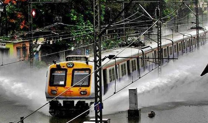 Rain slows down local trains in Mumbai